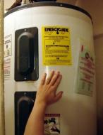 Berkeley water heater repair tech checks a Bradford White 40 gallon